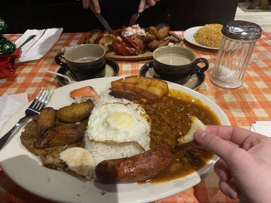 Their Bandeja Paisa ! Plus the 1/2 chicken in the background. Super yum!