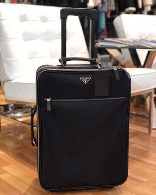 We have a wide variety of designer luggage pieces in store and online