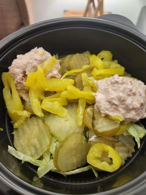 Tuna salad extra pickles and Bananna Peppers.