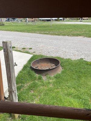 Odd fire pit location- how do they expect people to gather around and make s'mores safely?