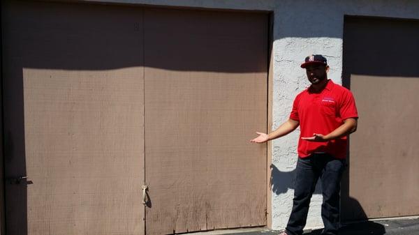 Old wooden tilt-up garage door. No good!