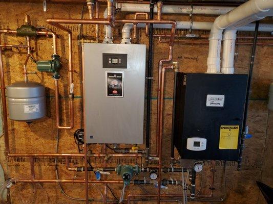 High efficiency units. Crown boiler and Bradford and White tankless hot water heater.