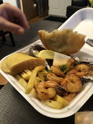 Grilled fish and shrimp meal with garlic bread. Shrimp fantastic and grilled fish pretty tasty