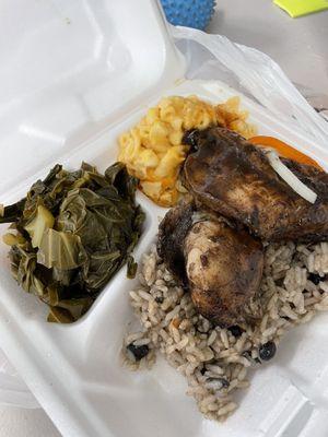 Jerk chicken with bean-rice, collard greens and Mac