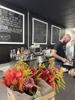 Lots of great coffee options, fresh flowers at the register, friendly barista