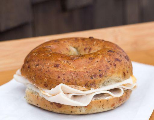 Loaded bagel. Bagel of choice, cream cheese, choice of colby or pepper jack cheese and choice of Turkey or black forest ham