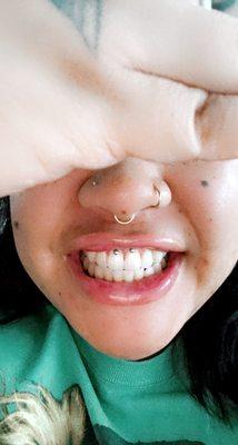 Smiley piercing, both nose piercing. Septum was done by someone else.