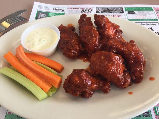 They serve wings 4 ways: plain, BBQ, buffalo, spicy. These are the spicy; they have a pretty decent bite