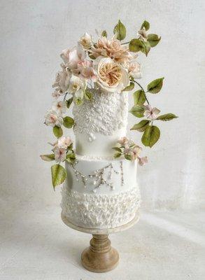 Custom wedding Cake with bas-relief and handmade gum paste flowers