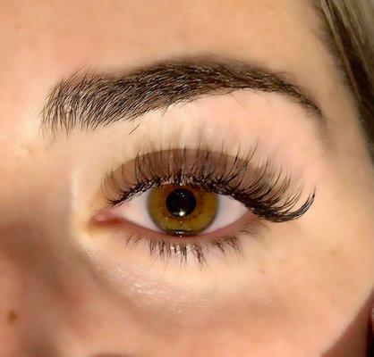 Look at those lashes! Get a winged liner effect with a textured lash extension set!