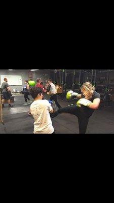 Muay Thai kick on pads