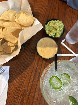 Jalepeño margarita with Tajin rim, queso, quacamole