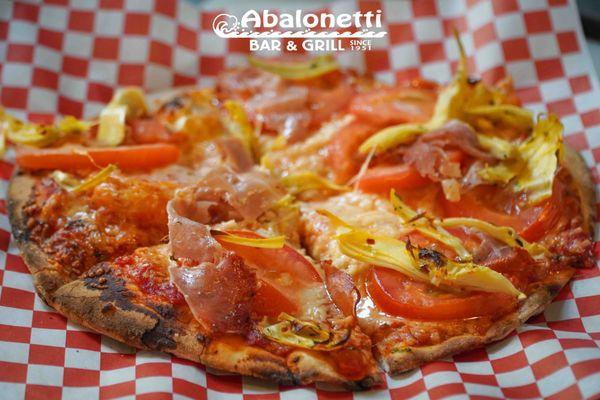 Parma Brick Oven Pizza: 
Tomato sauce, artichoke hearts, sliced prosciutto, Roma tomatoes, Parmesan cheese