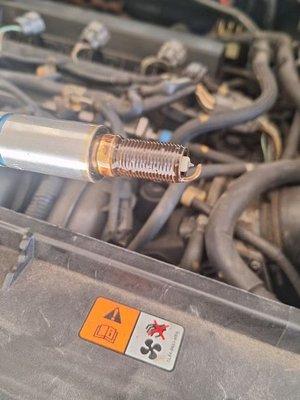 Spark plugs are constantly getting wet because leak was NEVER FIXED