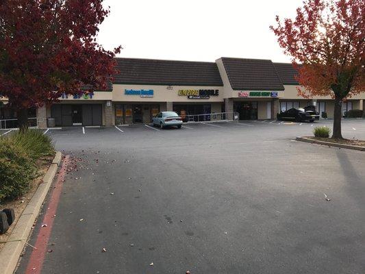 Street view of our office driving up Manzanita Ave just before the light to turn into the Safeway shopping center!