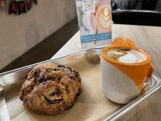 Rainy morning with cortado and cherry almond scone