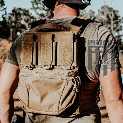 Tactical plate carrier. Tan color. Lightweight can accommodate 10x12 body armor plates.