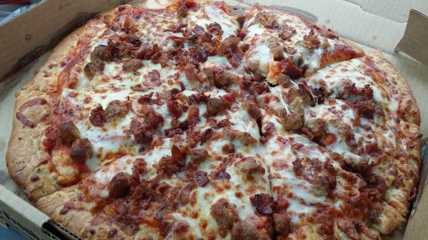 Large sausage, ham, & bacon pizza