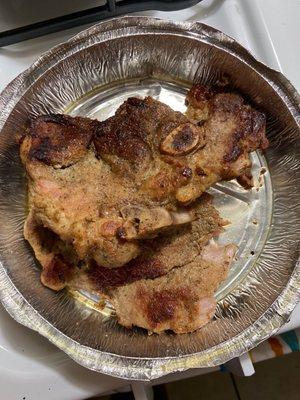 This is supposed to be a fried pork chop. Never seen a SPANISH fried pork chop that looked like this. It's hard and disgusting.