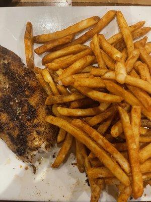 Blackened white fish with seasoned fries