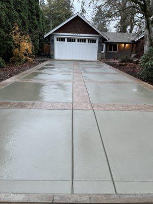 Driveway prior to them exposing the aggregate in the gray part.