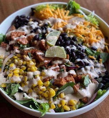 A variety of daily salads depending on what produce is locally in season.