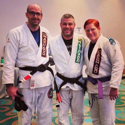 Ashlea Trachier earns her purple belt with Master Jeremy Hudson