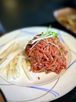 yukhoe (Korean steak tartare). VERY garlicky. A bit too strong for me, but if you love raw garlic, this is the dish to have.