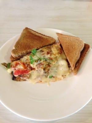 Egg white veggie omelet with whole wheat toast.. Healthiness to the top