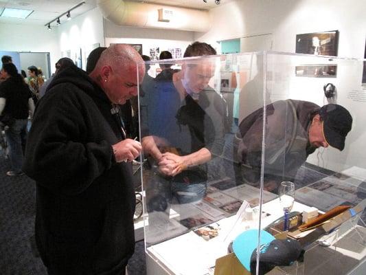 Visitors to the "Polk Street: Lives in Transition" exhibit (January 2009).