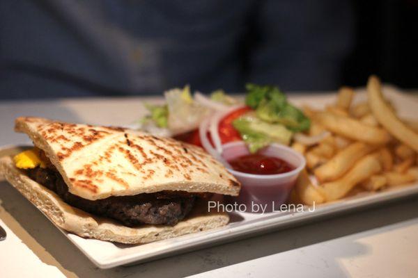 Arabic Burger ($15) - seasoned beef, egg, cheese, tomato, pickle on a pita and French fries