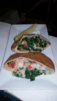 Spinach & tomato melt in a whole wheat pita