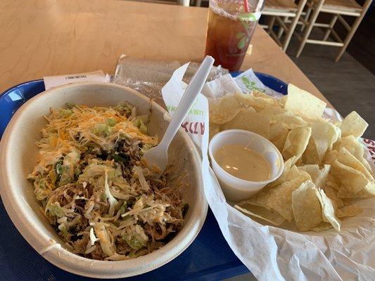 Pork bowl with chips and queso