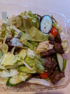 Steak tips were not drained and the salad was soaked/ruined by juices.