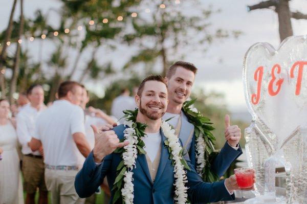 A monogrammed ice sculpture luge for the grooms' signature drink.