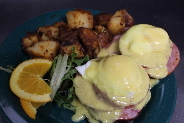 Traditional eggs Benedict. Can get with tomato hollandaise as well!