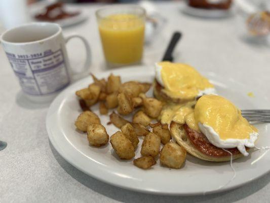 Eggs Benedict with the most amazing home fries.