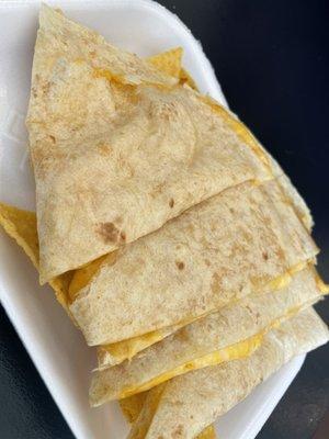 Simple Kids Cheese Quesadilla. Had lots of real cheese and was NOT small! Tasty not greasy. Tortilla was flaky.