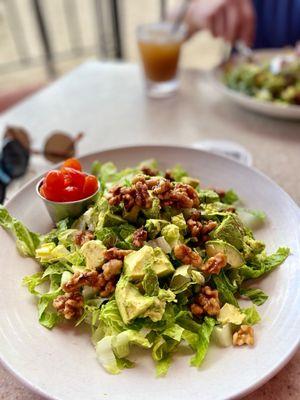 Custom Salad: greens, avocado, blue cheese crumbles, tomatoes and walnuts