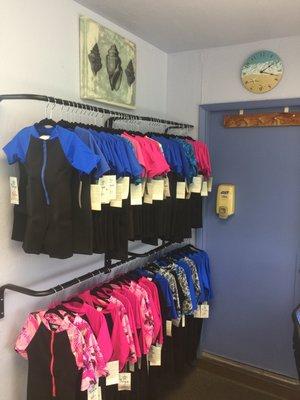 Children's wetsuits for sale in the swim school office!