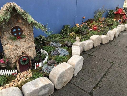 Adorable miniature house display. Gnomes? Fairies? Hobbits?