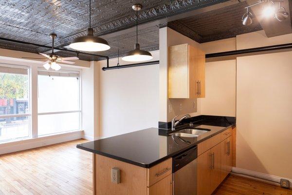 Modern kitchens within the apartments that have historic features, such as wooden floors and tin ceilings. Newly renovated facilities.