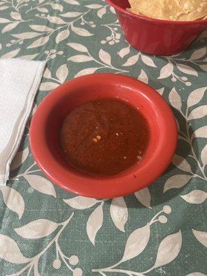 Salsa is a little spicy, freshly made and full of flavor.