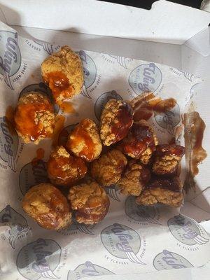 Chicken nuggets with sauce lightly dribbled