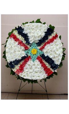 Assyrian Flag with fresh flowers