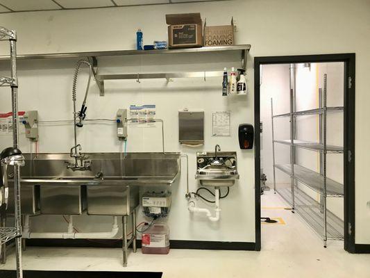 Spindle Kitchen, view of washing station and dry storage