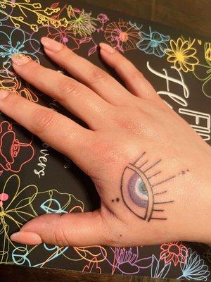 Hand tattoo