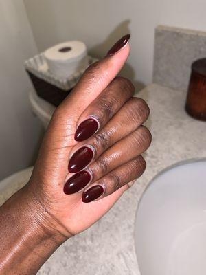 Full set with almond shaped nails and oxblood (deep red) gel polish