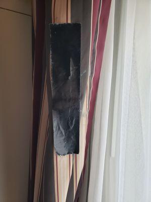 Curtain patched with duct tape