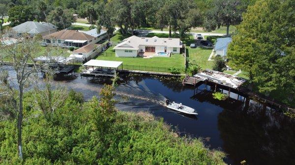 We also replace Boat Dock roofs. This home had a replacement roof and a new boat house roof installed by Farmers Roofs.